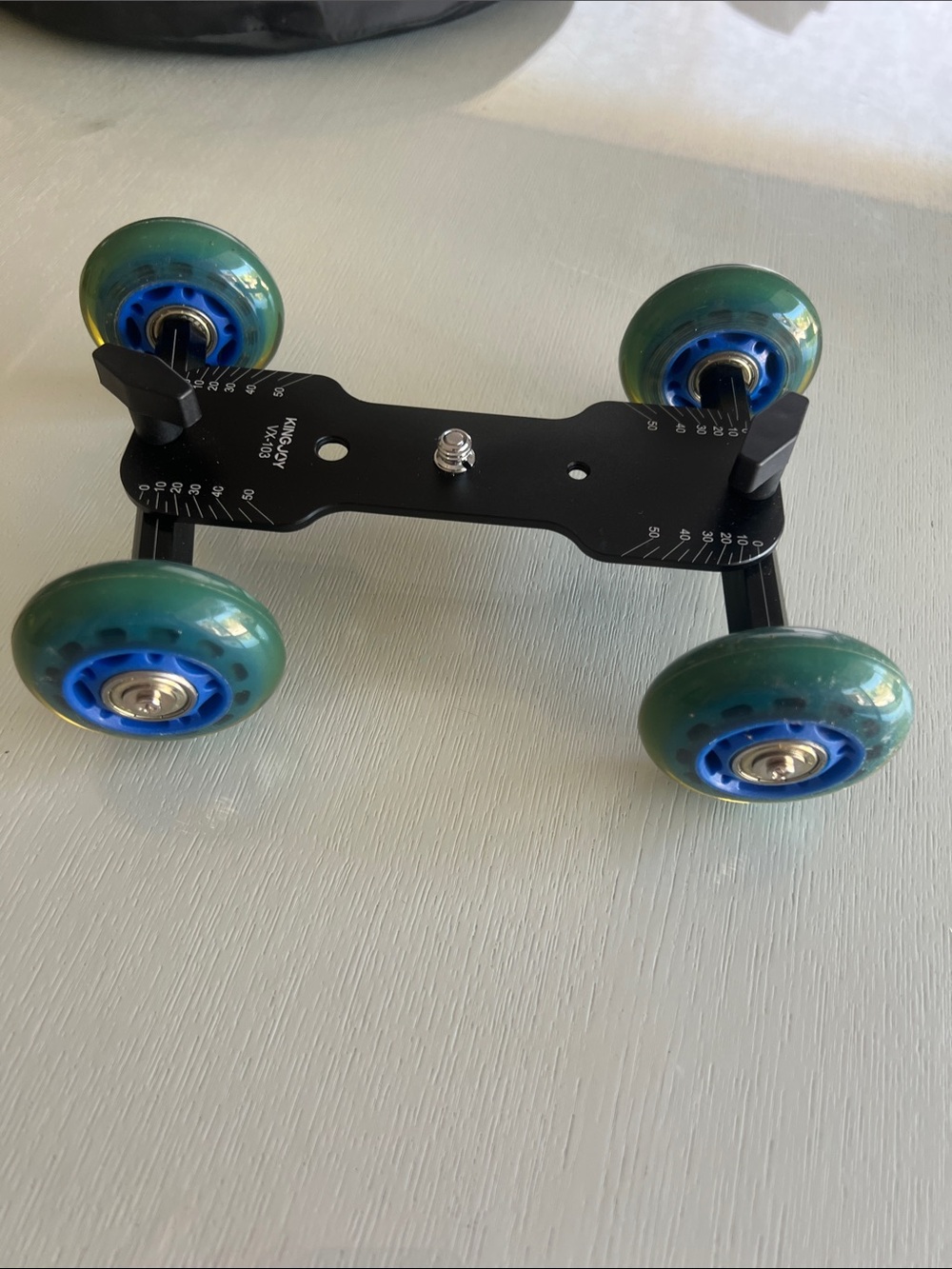 Compact Camera Dolly with Green and Blue Wheels - Black Frame